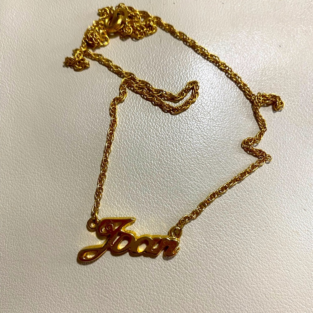 Joan Gold tone name necklace
